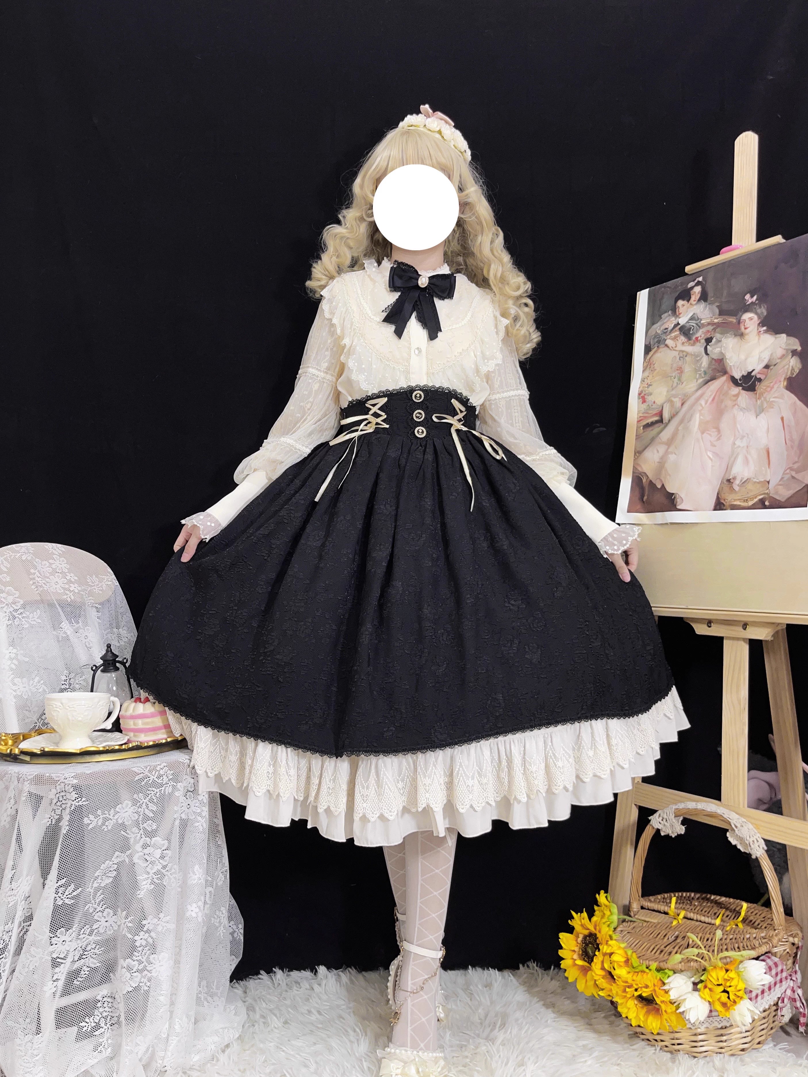 Design Concept:
This Lolita blouse features a refined stand collar and vintage CLA-inspired court style, combining elegance with classic Lolita charm. Available in Beige, Black, and White, it adds a sophisticated touch to any Lolita outfit. Perfect as a layering piece under jumpers or dresses, or worn on its own for daily wear and tea parties.