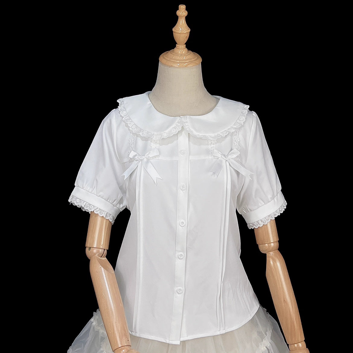Designed for summer comfort, this sweet Lolita blouse features a classic Peter Pan collar and breezy short sleeves. The lightweight fabric and playful design make it perfect for both casual JK styles and cute Lolita coordinates. Its versatile charm blends effortless daily wear with dreamy elegance, offering a fresh and youthful look for warm-weather fashion.