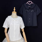 Designed for summer comfort, this sweet Lolita blouse features a classic Peter Pan collar and breezy short sleeves. The lightweight fabric and playful design make it perfect for both casual JK styles and cute Lolita coordinates. Its versatile charm blends effortless daily wear with dreamy elegance, offering a fresh and youthful look for warm-weather fashion.