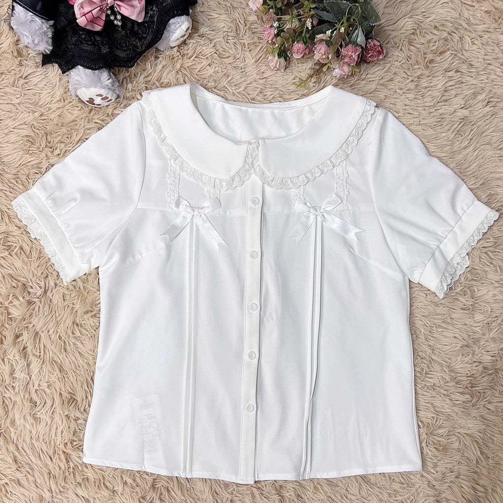 Designed for summer comfort, this sweet Lolita blouse features a classic Peter Pan collar and breezy short sleeves. The lightweight fabric and playful design make it perfect for both casual JK styles and cute Lolita coordinates. Its versatile charm blends effortless daily wear with dreamy elegance, offering a fresh and youthful look for warm-weather fashion.