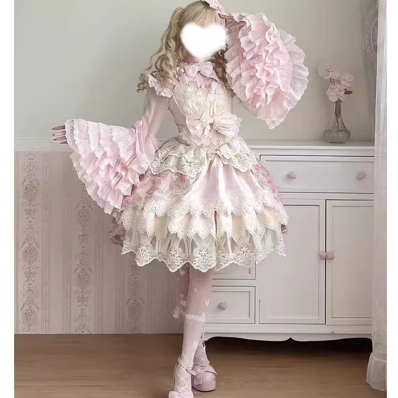 This dreamy Lolita blouse features soft puff sleeves and delicate sheer mesh detailing in blush pink and peach tones. Designed for daily wear, its lightweight fabric offers comfortable layering under JSKs or jumpers. The sweet yet versatile design balances elegance with practicality, perfect for creating charmingly coordinations with a touch of ethereal romance.