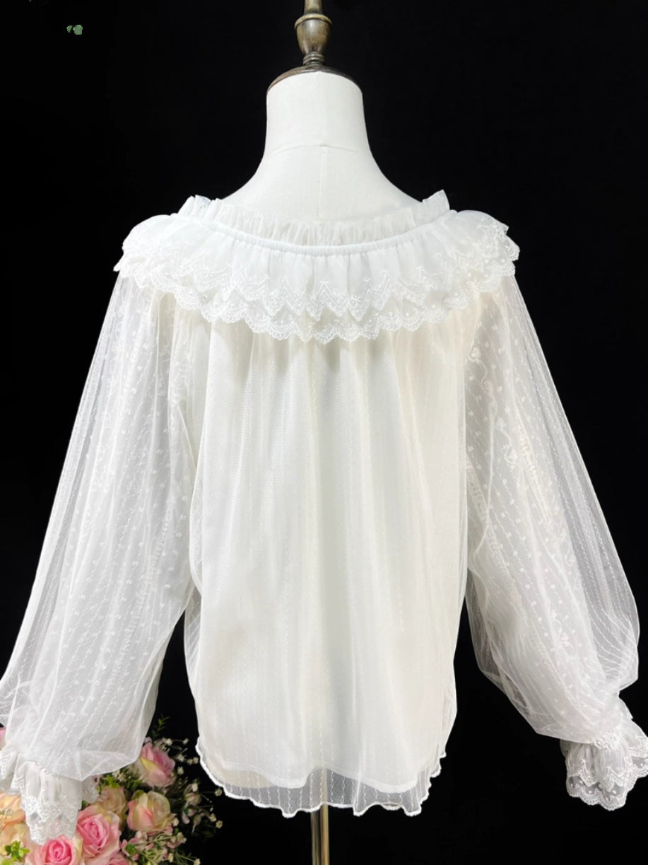 This elegant blouse combines sheer mesh fabric with dramatic leg-of-mutton sleeves and a comfortable elastic neckline. Perfect for spring and autumn layering, its lightweight texture adds depth to coordinates while maintaining a romantic silhouette. The design balances vintage inspiration with modern wearability, creating a versatile piece that transitions seamlessly from sweet to Gothic styles.