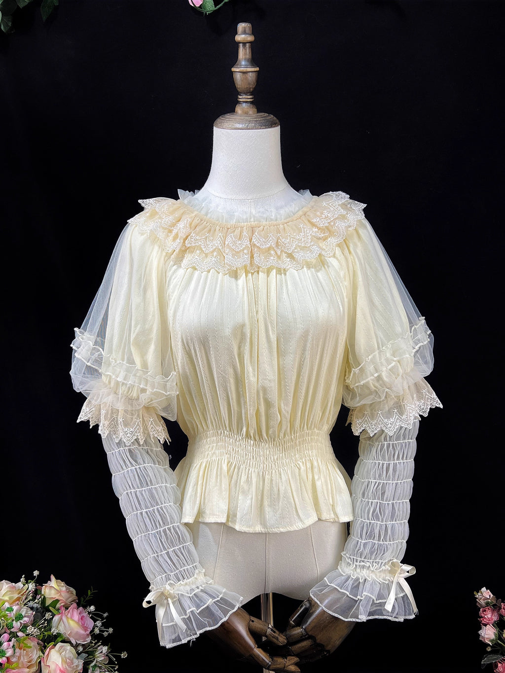 This retro-inspired blouse blends soft cotton with delicate mesh panels for textured elegance. The round neckline and relaxed fit offer timeless comfort, while subtle vintage details create a versatile layering piece. Perfect under jumpers or dresses, it effortlessly bridges classic and sweet Lolita styles with understated sophistication.