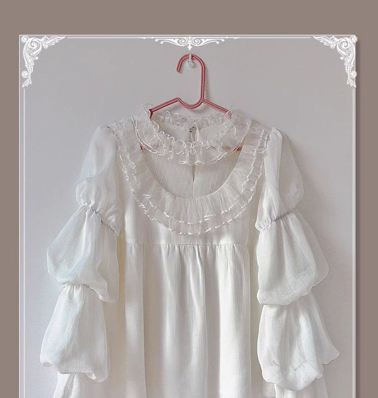 Design Concept:
This Lolita blouse combines elegance and romantic charm with lotus leaf cuffs, hollow lace detailing, and loose chiffon sleeves. Available in apricot, white, and the generated color, the blouse offers a versatile and airy silhouette that enhances any Lolita outfit. Its soft, flowing fabric provides comfort while maintaining a delicate, refined look, making it ideal as an inner layer or standalone top for daily wear or tea party occasions.