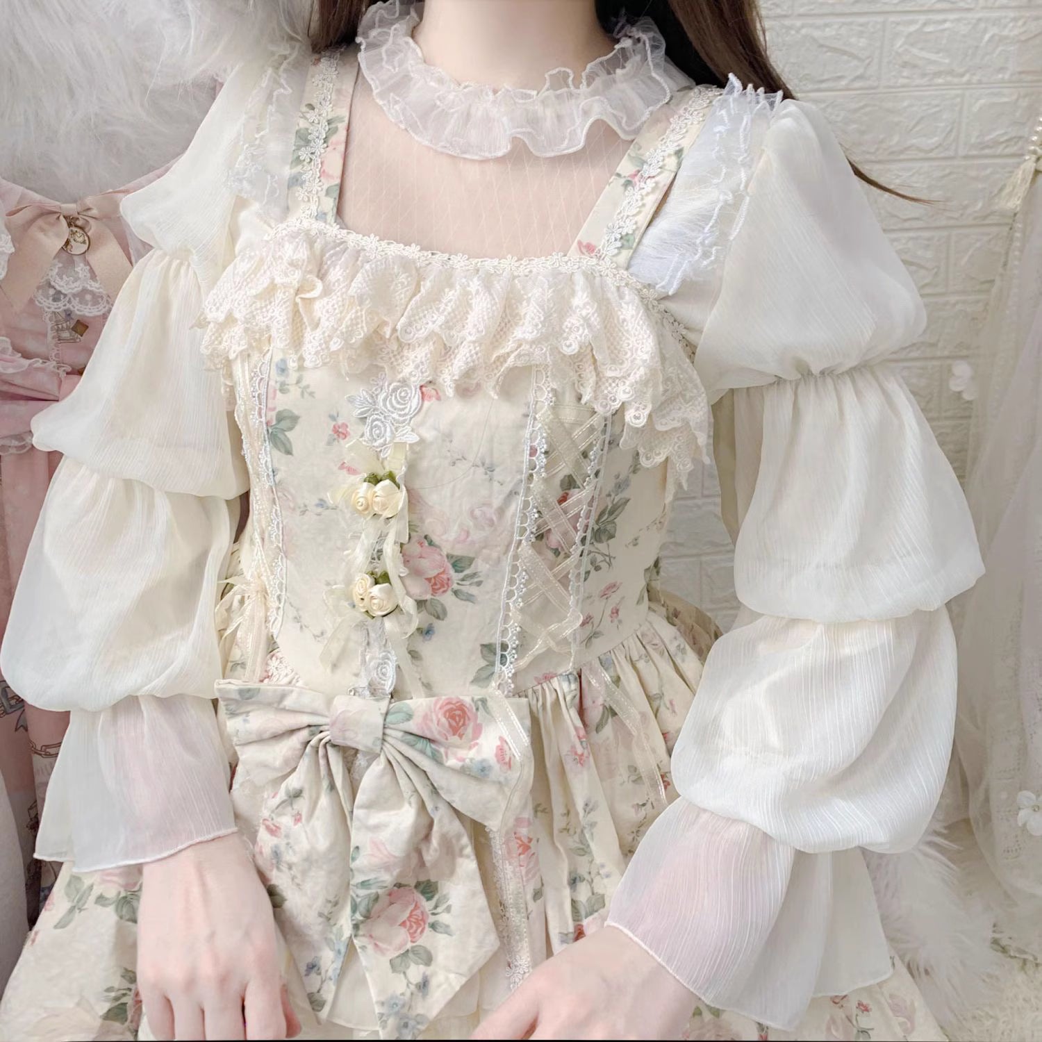 Design Concept:
This Lolita blouse combines elegance and romantic charm with lotus leaf cuffs, hollow lace detailing, and loose chiffon sleeves. Available in apricot, white, and the generated color, the blouse offers a versatile and airy silhouette that enhances any Lolita outfit. Its soft, flowing fabric provides comfort while maintaining a delicate, refined look, making it ideal as an inner layer or standalone top for daily wear or tea party occasions.