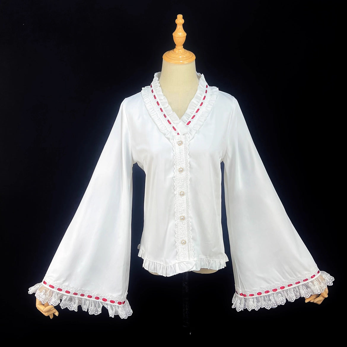 Design Concept:
This Lolita blouse blends retro elegance with a touch of Eastern inspiration. Crafted in soft apricot and pure white tones, it features a graceful V-neckline adorned with delicate striped patterns. The flared princess sleeves add a dramatic yet refined silhouette, perfect for layering under JSKs or wearing as a standalone statement piece. Lightweight chiffon fabric ensures breathability and comfort, making it ideal for daily wear or casual tea party gatherings.