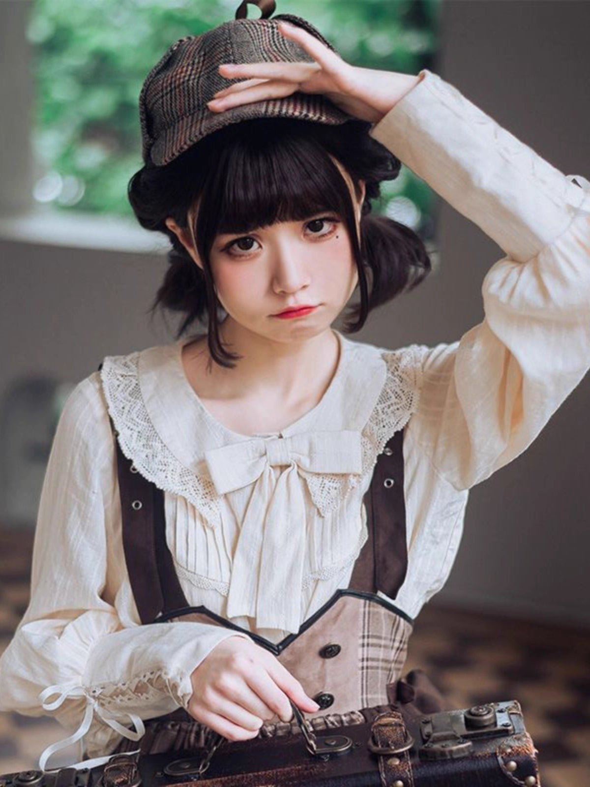 Elegance meets drama in this vintage-inspired Lolita blouse. The statement gigot sleeves create a sophisticated silhouette, perfect for achieving a classic romantic look. Crafted in a versatile beige hue, this blouse serves as an essential layering piece that complements any Lolita coordinate. Made from high-quality breathable fabric, it combines historical charm with modern comfort. Its timeless design makes it ideal for both casual wear and formal tea parties, offering effortless elegance.