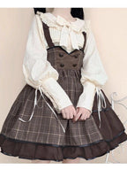 Elegance meets drama in this vintage-inspired Lolita blouse. The statement gigot sleeves create a sophisticated silhouette, perfect for achieving a classic romantic look. Crafted in a versatile beige hue, this blouse serves as an essential layering piece that complements any Lolita coordinate. Made from high-quality breathable fabric, it combines historical charm with modern comfort. Its timeless design makes it ideal for both casual wear and formal tea parties, offering effortless elegance.