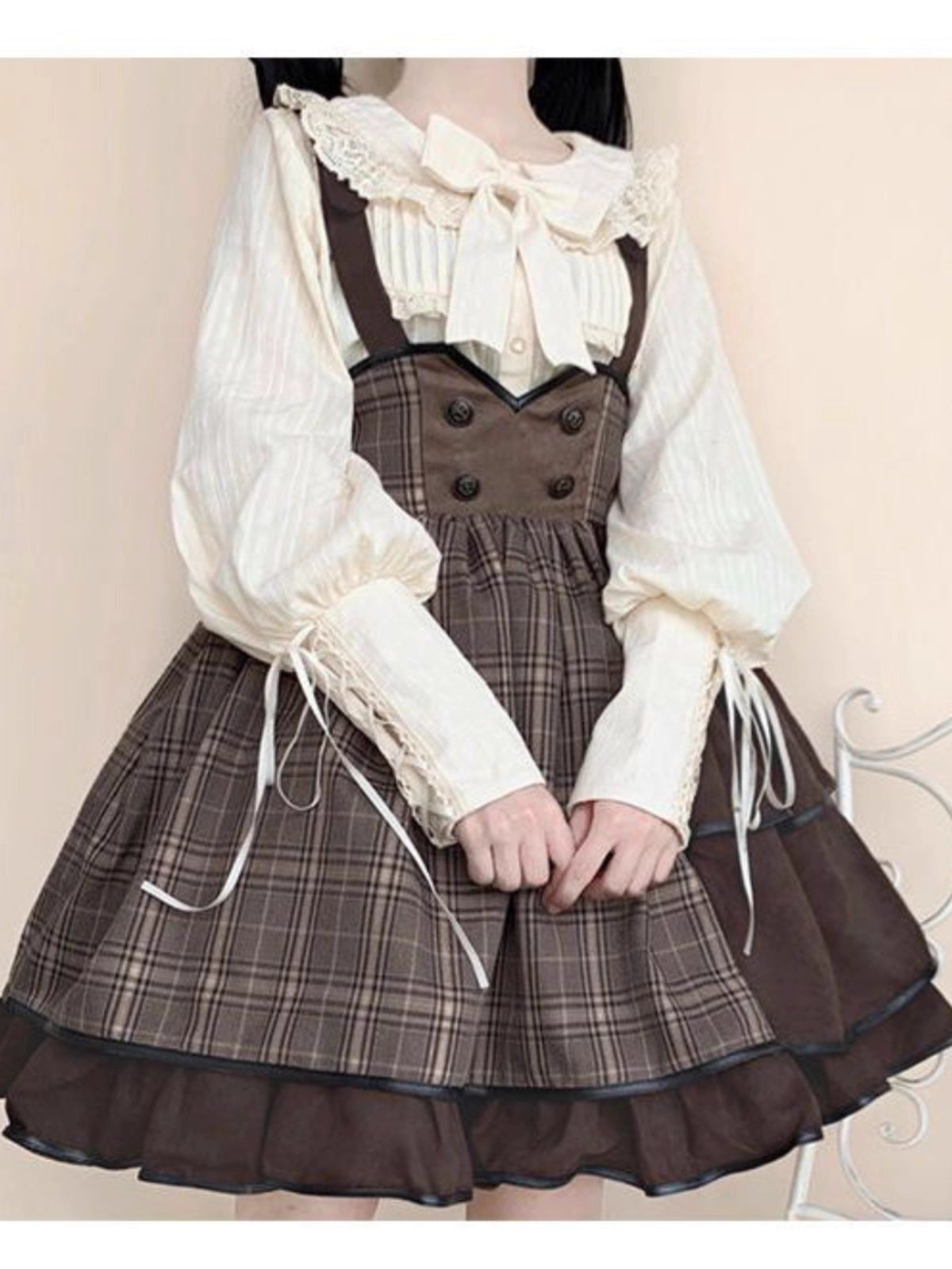 Elegance meets drama in this vintage-inspired Lolita blouse. The statement gigot sleeves create a sophisticated silhouette, perfect for achieving a classic romantic look. Crafted in a versatile beige hue, this blouse serves as an essential layering piece that complements any Lolita coordinate. Made from high-quality breathable fabric, it combines historical charm with modern comfort. Its timeless design makes it ideal for both casual wear and formal tea parties, offering effortless elegance.