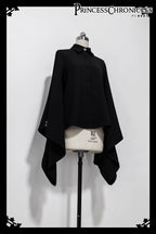 Inspired by Tang dynasty aesthetics, this top reimagines classical elegance with dramatic pointed collars and flowing wide sleeves. The luxurious black fabric serves as a canvas for subtle embroidered pomegranate motifs—symbolizing prosperity and unity. Lightweight yet structured, it layers seamlessly under modern outerwear, blending historical narrative with wearable artistry for a timeless statement of cultural fusion.