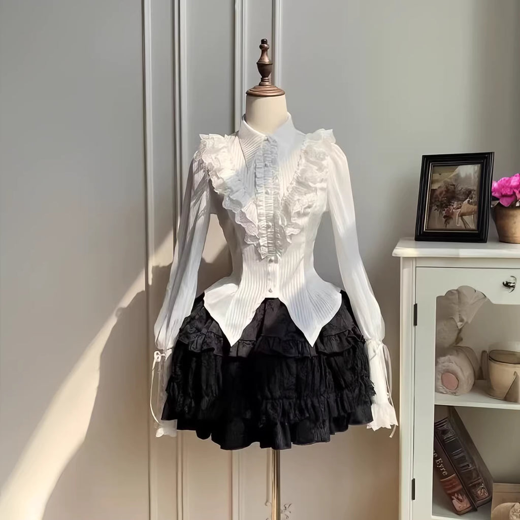 Design Concept:

This Gothic Lolita blouse is crafted with a thin and lightweight fabric, featuring vintage-inspired lantern sleeves and a refined prince-style silhouette. The black and white color options enhance its versatility, allowing it to pair elegantly with a variety of Lolita skirts or outerwear. Its delicate construction balances both comfort and sophistication, making it suitable for daily wear, themed gatherings, or cosplay occasions.