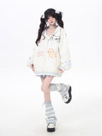 This adorable hoodie combines sweet lace accents with a playful kitten print in classic black and white. The relaxed fit and soft fabric offer everyday comfort, while the checkered pattern and lace details add a touch of romantic charm. Perfect for expressing a love for all things cute and cozy this autumn.