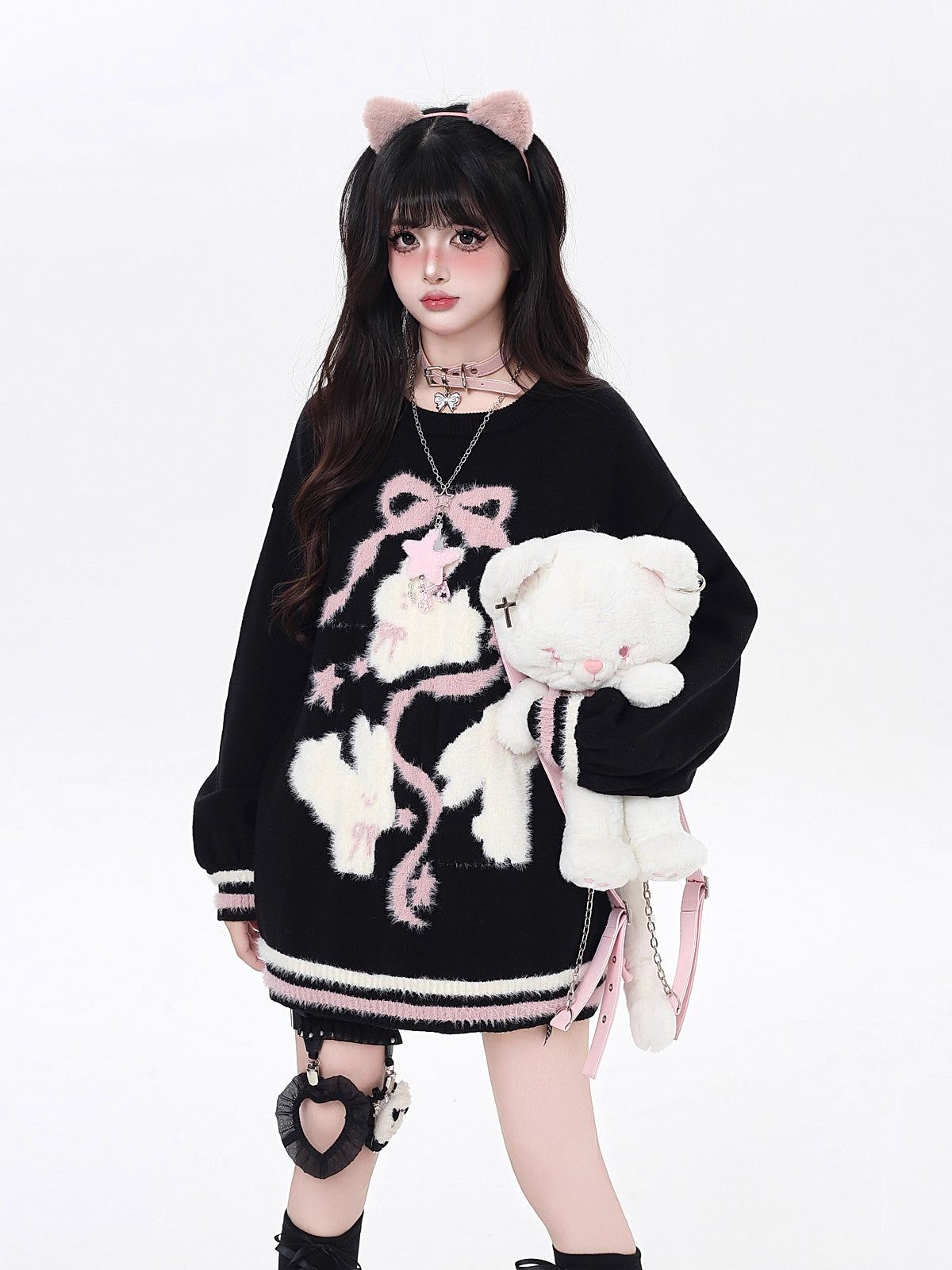 Playful yet provocative, this limited edition knit sweater blends childlike charm with a subtle dark edge. The classic round neck and soft fabric offer timeless comfort, while the contrasting red and black hues create a striking visual tension. Lightweight and versatile, it layers effortlessly under jackets or stands alone as a statement piece—perfect for expressing a duality of sweetness and rebellion.