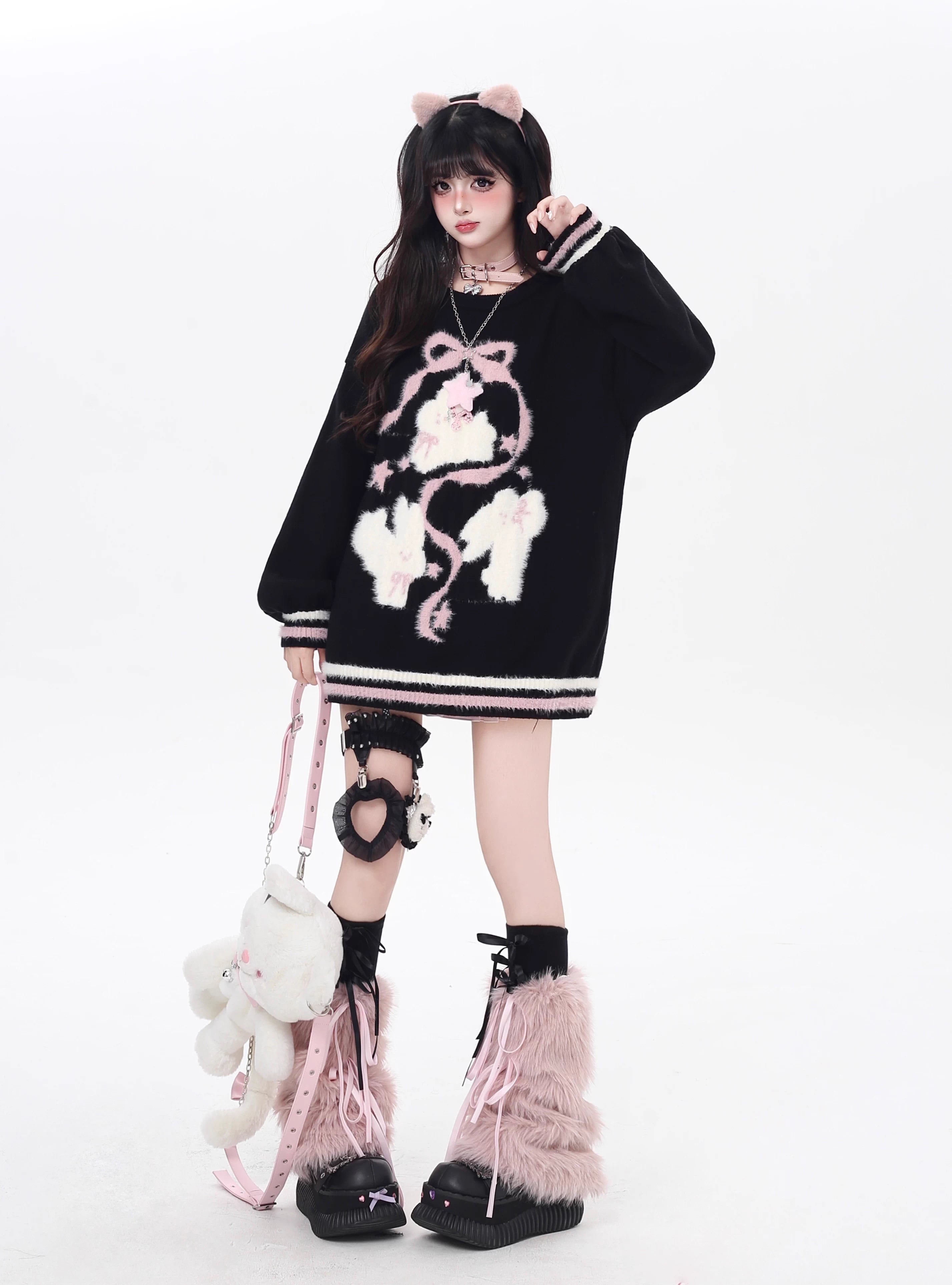Playful yet provocative, this limited edition knit sweater blends childlike charm with a subtle dark edge. The classic round neck and soft fabric offer timeless comfort, while the contrasting red and black hues create a striking visual tension. Lightweight and versatile, it layers effortlessly under jackets or stands alone as a statement piece—perfect for expressing a duality of sweetness and rebellion.