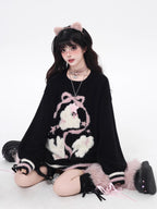 Playful yet provocative, this limited edition knit sweater blends childlike charm with a subtle dark edge. The classic round neck and soft fabric offer timeless comfort, while the contrasting red and black hues create a striking visual tension. Lightweight and versatile, it layers effortlessly under jackets or stands alone as a statement piece—perfect for expressing a duality of sweetness and rebellion.