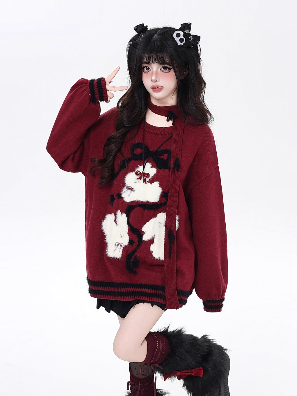 Playful yet provocative, this limited edition knit sweater blends childlike charm with a subtle dark edge. The classic round neck and soft fabric offer timeless comfort, while the contrasting red and black hues create a striking visual tension. Lightweight and versatile, it layers effortlessly under jackets or stands alone as a statement piece—perfect for expressing a duality of sweetness and rebellion.