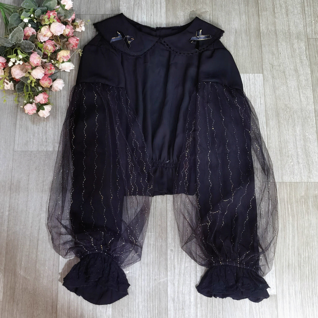 Design Concept:
This Lolita blouse features a delicate doll collar and a cropped, short silhouette, designed as a versatile inner layer for JSKs and other Lolita outfits. The soft chiffon fabric adds a gentle drape and elegant touch, making it suitable for layering or wearing on its own. Available in White and Black, it complements both sweet and Gothic Lolita styles.