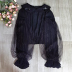 Design Concept:
This Lolita blouse features a delicate doll collar and a cropped, short silhouette, designed as a versatile inner layer for JSKs and other Lolita outfits. The soft chiffon fabric adds a gentle drape and elegant touch, making it suitable for layering or wearing on its own. Available in White and Black, it complements both sweet and Gothic Lolita styles.