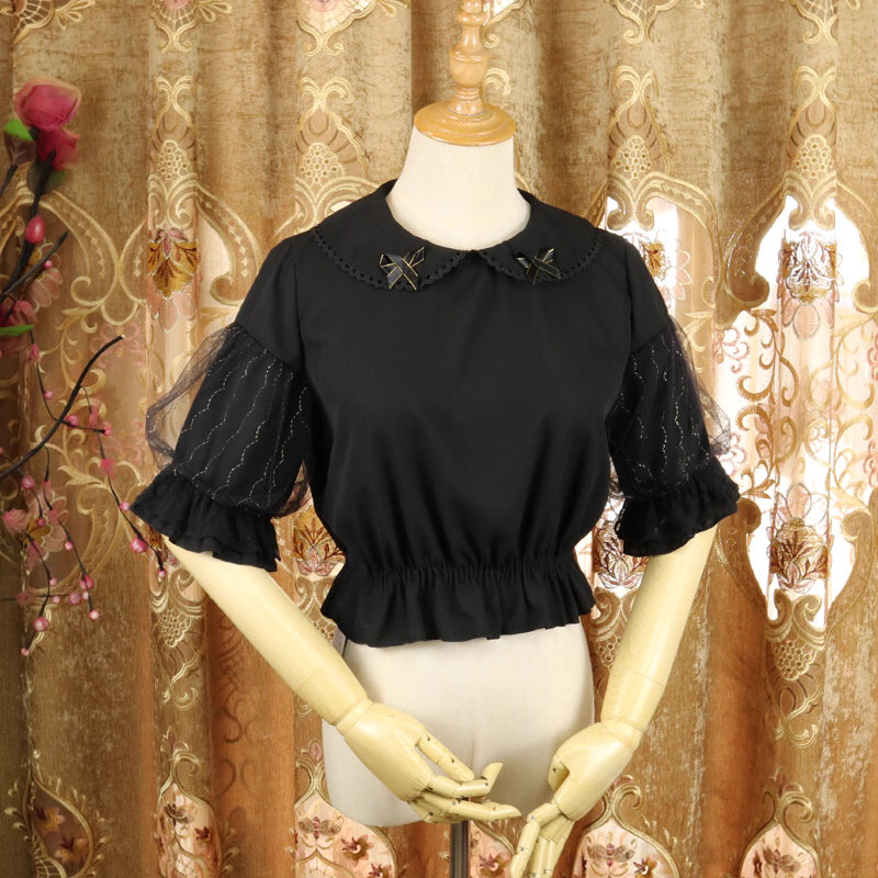 Design Concept:
This Lolita blouse features a delicate doll collar and a cropped, short silhouette, designed as a versatile inner layer for JSKs and other Lolita outfits. The soft chiffon fabric adds a gentle drape and elegant touch, making it suitable for layering or wearing on its own. Available in White and Black, it complements both sweet and Gothic Lolita styles.