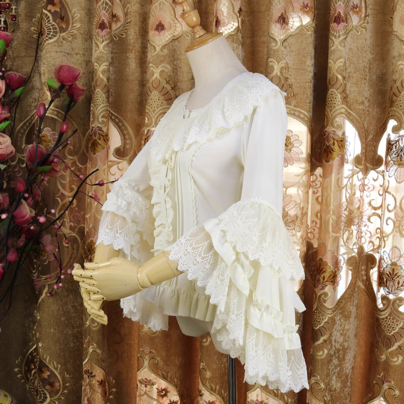 Design Concept:
This Lolita blouse features delicate lace-trimmed princess sleeves and a classic round neckline, creating a soft, elegant silhouette perfect for layering. The lightweight chiffon fabric adds a graceful drape, enhancing any Lolita outfit. Available in Ivory, Black, and Apricot, it suits a variety of styling preferences, from sweet to Gothic-inspired looks.