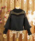 Design Concept:
This Lolita blouse combines classic elegance with a romantic touch, featuring soft chiffon fabric, graceful leg-of-mutton sleeves, and a refined stand collar. Available in Pure Ivory, Gold-Thread Ivory, and Pure Black, it brings versatile charm to both subtle and dramatic Lolita coordinates. The flowing silhouette and detailed construction make it perfect for layering under dresses or wearing as a statement piece on its own.