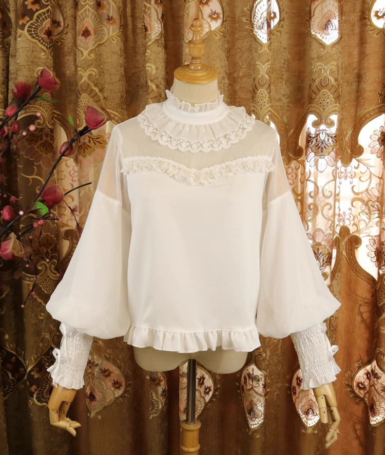 Design Concept:
This Lolita blouse combines classic elegance with a romantic touch, featuring soft chiffon fabric, graceful leg-of-mutton sleeves, and a refined stand collar. Available in Pure Ivory, Gold-Thread Ivory, and Pure Black, it brings versatile charm to both subtle and dramatic Lolita coordinates. The flowing silhouette and detailed construction make it perfect for layering under dresses or wearing as a statement piece on its own.