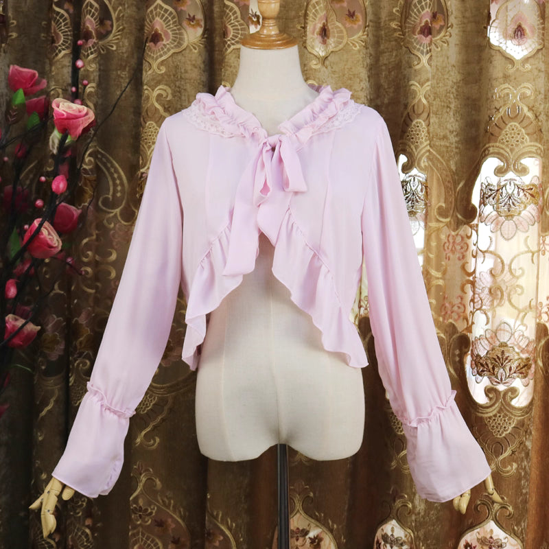 Design Concept:
This Lolita blouse doubles as a short chiffon cardigan featuring long sleeves and delicate ruffle trims. Designed as a lightweight outer layer, it adds elegance while providing subtle sun protection. Available in White, Apricot, Pink, and Black, it complements a variety of Lolita outfits and coordinates effortlessly with dresses or skirts.