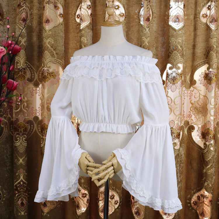 Design Concept:
This short chiffon Lolita blouse is designed with a romantic off-shoulder silhouette, combining lightness and elegance. The cropped cut highlights the waistline, making it a perfect inner layer for JSKs or skirts. Available in White and Black, it balances sweetness and sophistication, offering versatile styling for different Lolita aesthetics.