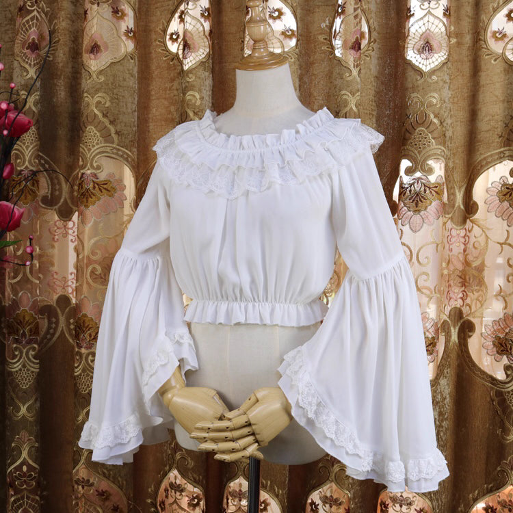 Design Concept:
This short chiffon Lolita blouse is designed with a romantic off-shoulder silhouette, combining lightness and elegance. The cropped cut highlights the waistline, making it a perfect inner layer for JSKs or skirts. Available in White and Black, it balances sweetness and sophistication, offering versatile styling for different Lolita aesthetics.