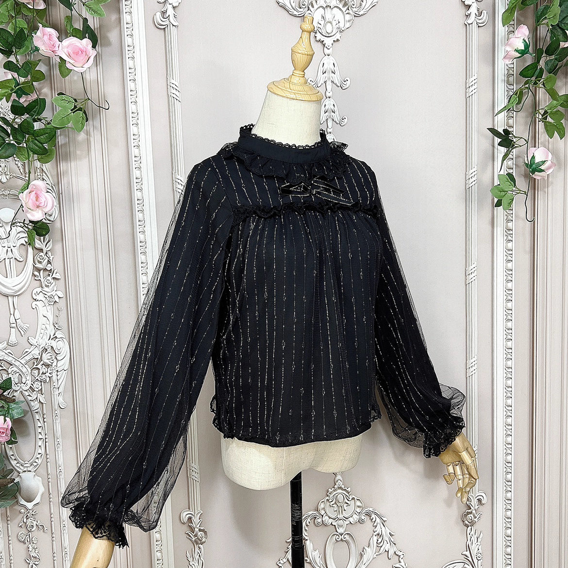 Design Concept:
This Lolita blouse combines gold-thread black and pure milk white into a refined and versatile design. Crafted from lightweight chiffon with a semi-high collar and delicate mesh overlay, it creates an elegant yet sweet atmosphere. The retro-inspired long sleeves flow gracefully with a soft silhouette, making it perfect for pairing with JSKs or skirts. Whether in shimmering gold-thread black for a dramatic gothic charm, or in pure milk white for a gentle and innocent look, this blouse adapts 