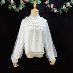 Design Concept:
This Lolita blouse combines gold-thread black and pure milk white into a refined and versatile design. Crafted from lightweight chiffon with a semi-high collar and delicate mesh overlay, it creates an elegant yet sweet atmosphere. The retro-inspired long sleeves flow gracefully with a soft silhouette, making it perfect for pairing with JSKs or skirts. Whether in shimmering gold-thread black for a dramatic gothic charm, or in pure milk white for a gentle and innocent look, this blouse adapts 