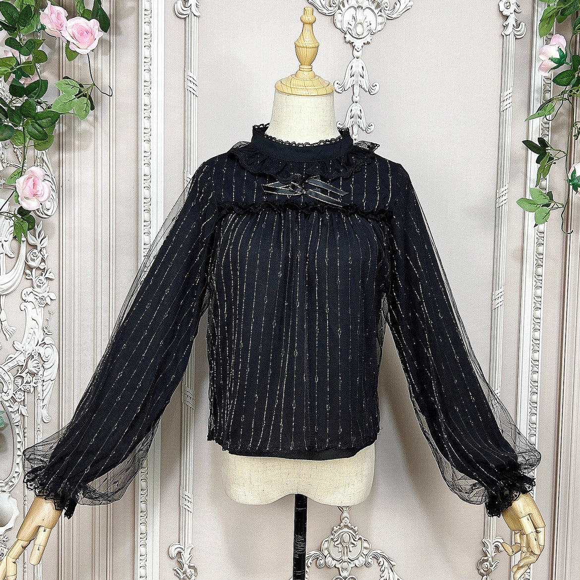 Design Concept:
This Lolita blouse combines gold-thread black and pure milk white into a refined and versatile design. Crafted from lightweight chiffon with a semi-high collar and delicate mesh overlay, it creates an elegant yet sweet atmosphere. The retro-inspired long sleeves flow gracefully with a soft silhouette, making it perfect for pairing with JSKs or skirts. Whether in shimmering gold-thread black for a dramatic gothic charm, or in pure milk white for a gentle and innocent look, this blouse adapts 