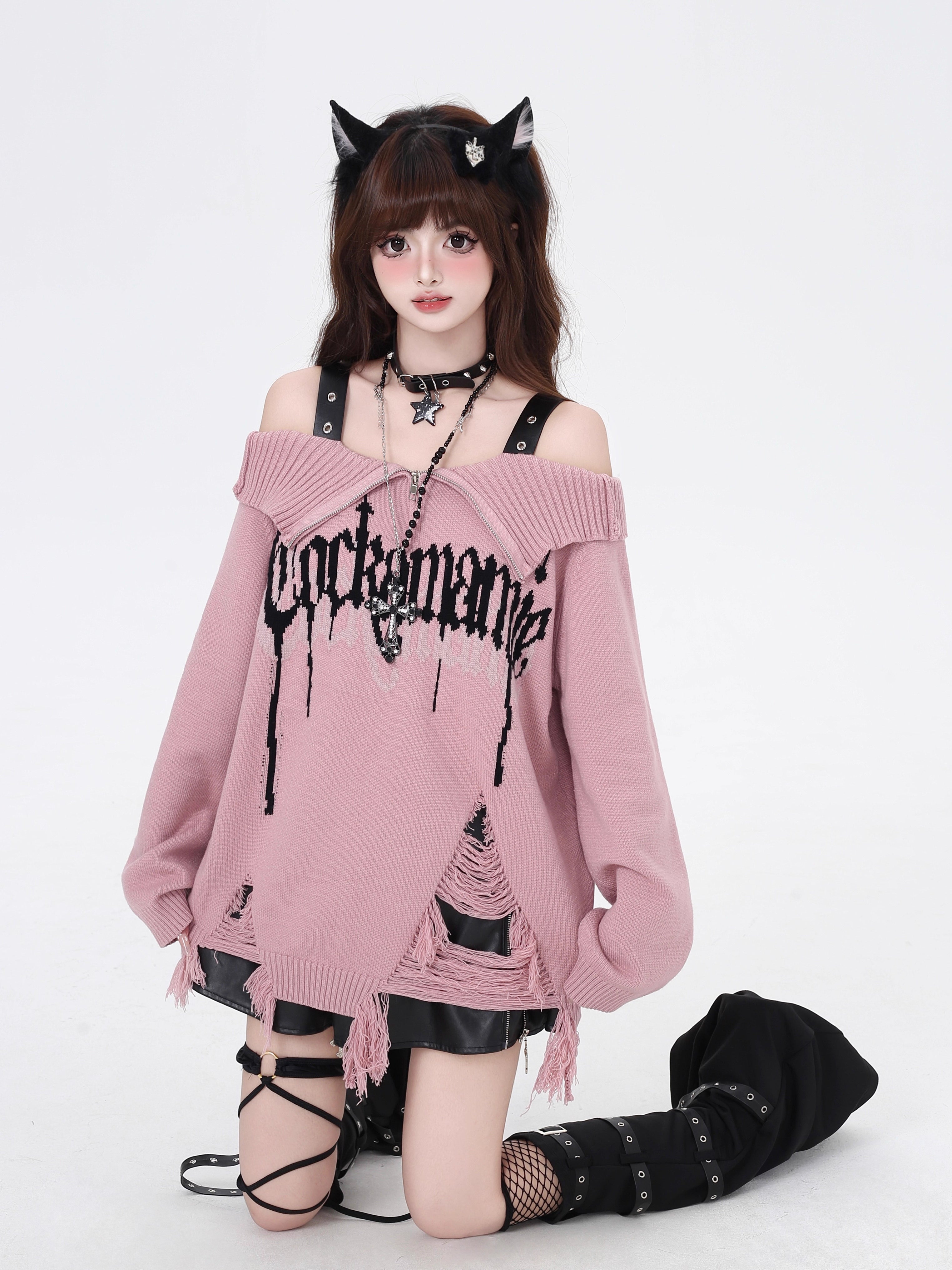 A daring twist on dark romance, this sweater blends gothic subversion with playful vibrancy. The structured zip collar frames off-shoulder styling for a bold yet elegant silhouette, while the unexpected red and pink hues reinterpret traditional gothic tones. Lightweight yet textured knit offers versatility for layered winter wear. For those who embrace contrast—where edge meets elegance, and rebellion meets softness.