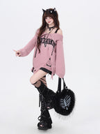 A daring twist on dark romance, this sweater blends gothic subversion with playful vibrancy. The structured zip collar frames off-shoulder styling for a bold yet elegant silhouette, while the unexpected red and pink hues reinterpret traditional gothic tones. Lightweight yet textured knit offers versatility for layered winter wear. For those who embrace contrast—where edge meets elegance, and rebellion meets softness.