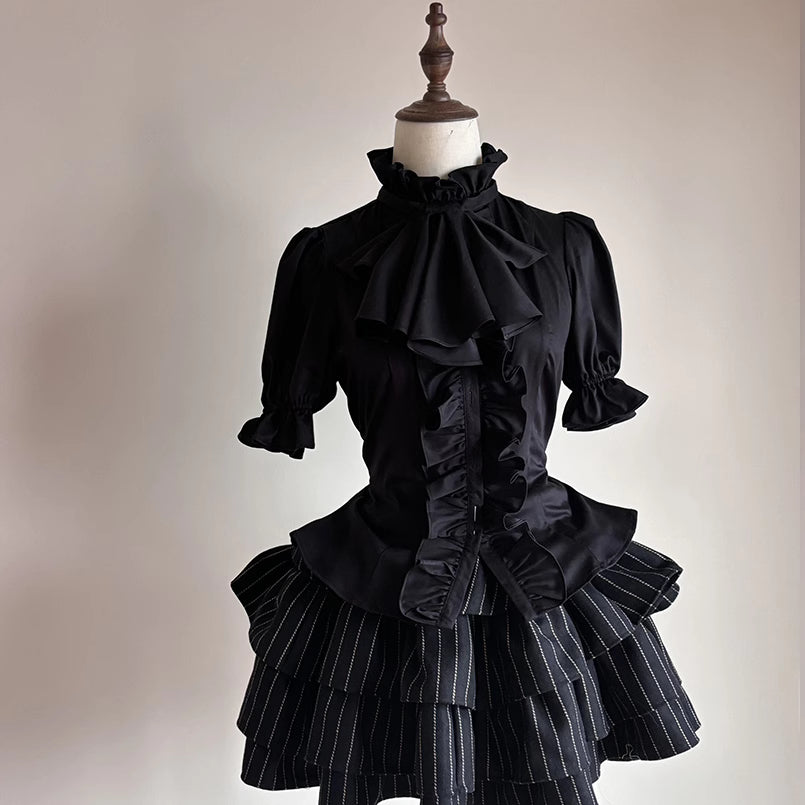 This striking Klein blue Lolita shirt redefines Gothic elegance with its bold fusion of medieval prince aesthetics and contemporary dark fashion. The short sleeve design features intricate ruffles and Victorian-inspired tailoring, creating a dramatic yet wearable statement piece. The vibrant Klein blue hue contrasts brilliantly with classic Gothic elements, offering a modern twist on aristocratic style. Perfect for layering or standalone wear, it embodies luxurious rebellion—ideal for those seeking to merge