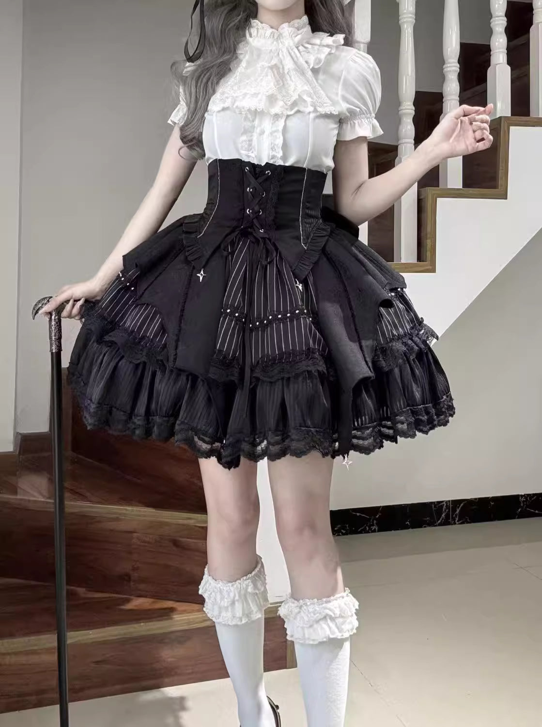 Design Concept:
This Gothic Lolita blouse features a lightweight, soft fabric with vintage-style lantern sleeves and a slim, prince-inspired silhouette. Offered in both black and white, it can be effortlessly styled with various Lolita skirts or layered under outerwear. Combining elegance with comfort, it’s ideal for everyday wear, themed tea parties, or cosplay events.