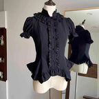 Design Concept:
This Gothic Lolita blouse features a lightweight, soft fabric with vintage-style lantern sleeves and a slim, prince-inspired silhouette. Offered in both black and white, it can be effortlessly styled with various Lolita skirts or layered under outerwear. Combining elegance with comfort, it’s ideal for everyday wear, themed tea parties, or cosplay events.