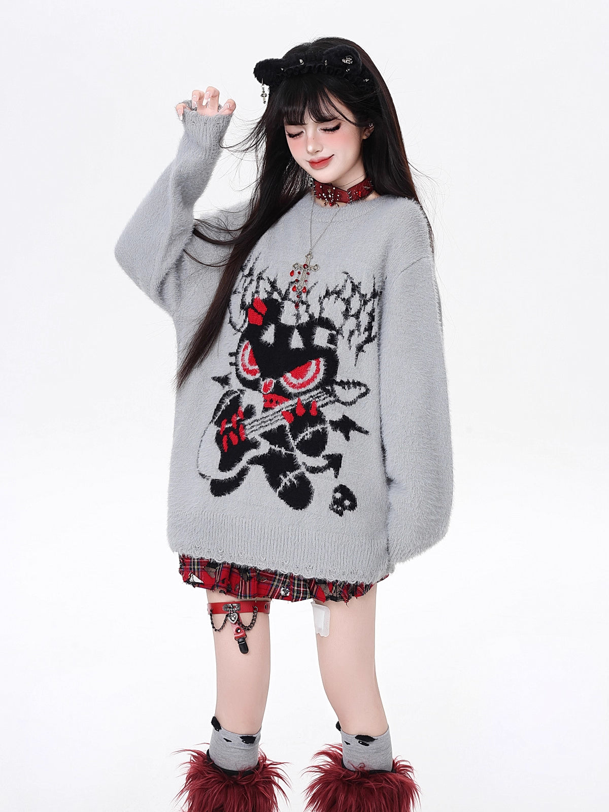 Design Concept:

This Lolita Blouses Gray Black Soft Knit Round Neck Sweater combines a sweet yet edgy aesthetic, crafted for comfort and casual style. Made from a soft, cozy knit, it features a relaxed, loose fit and a classic round neckline, perfect for layering or wearing alone. The design balances playful sweetness with subtle rock-inspired details, making it versatile for autumn and winter casual wear. Ideal for everyday outings, school, or casual gatherings, this pullover sweater is a staple piece for