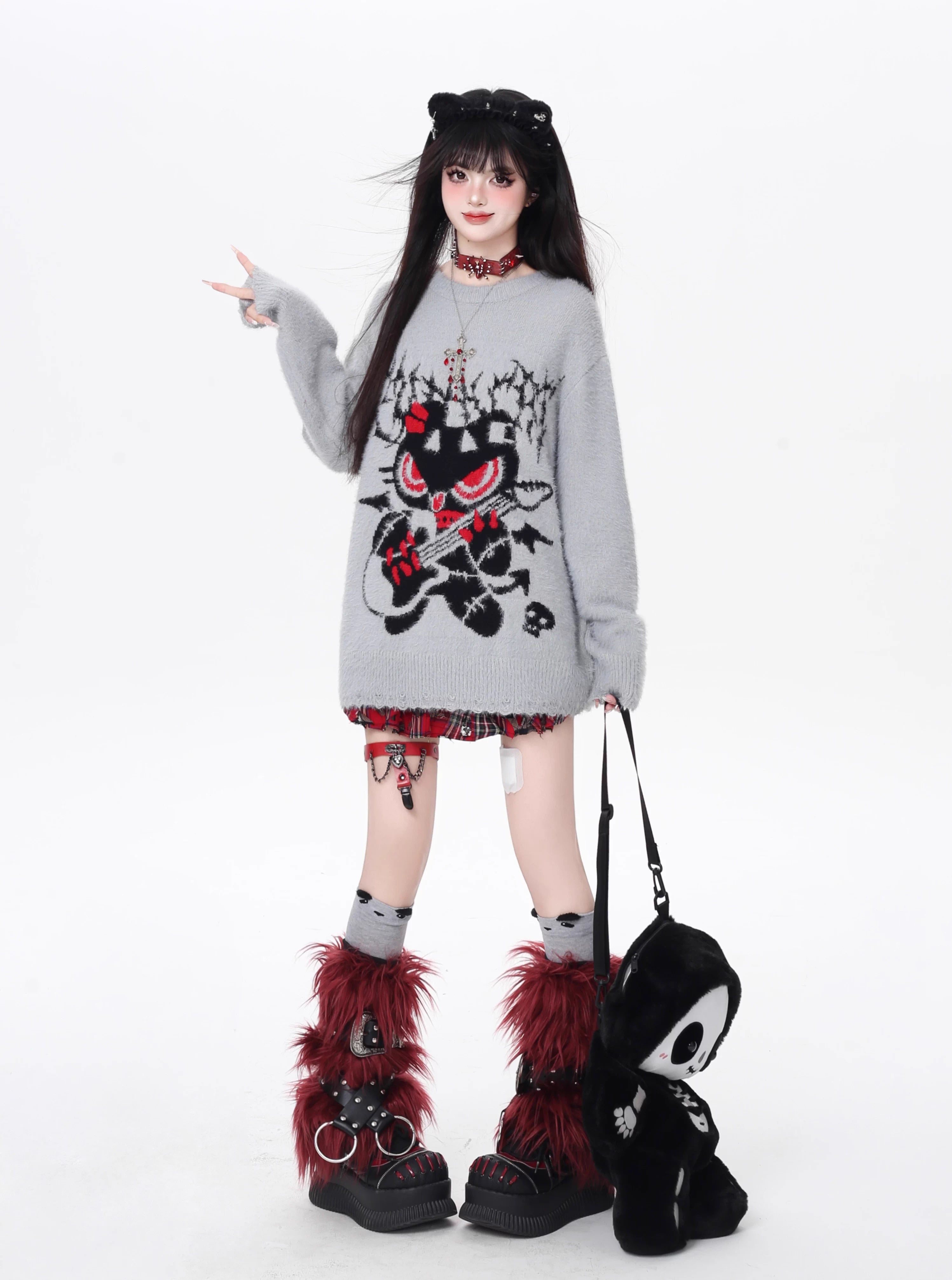 Design Concept:

This Lolita Blouses Gray Black Soft Knit Round Neck Sweater combines a sweet yet edgy aesthetic, crafted for comfort and casual style. Made from a soft, cozy knit, it features a relaxed, loose fit and a classic round neckline, perfect for layering or wearing alone. The design balances playful sweetness with subtle rock-inspired details, making it versatile for autumn and winter casual wear. Ideal for everyday outings, school, or casual gatherings, this pullover sweater is a staple piece for
