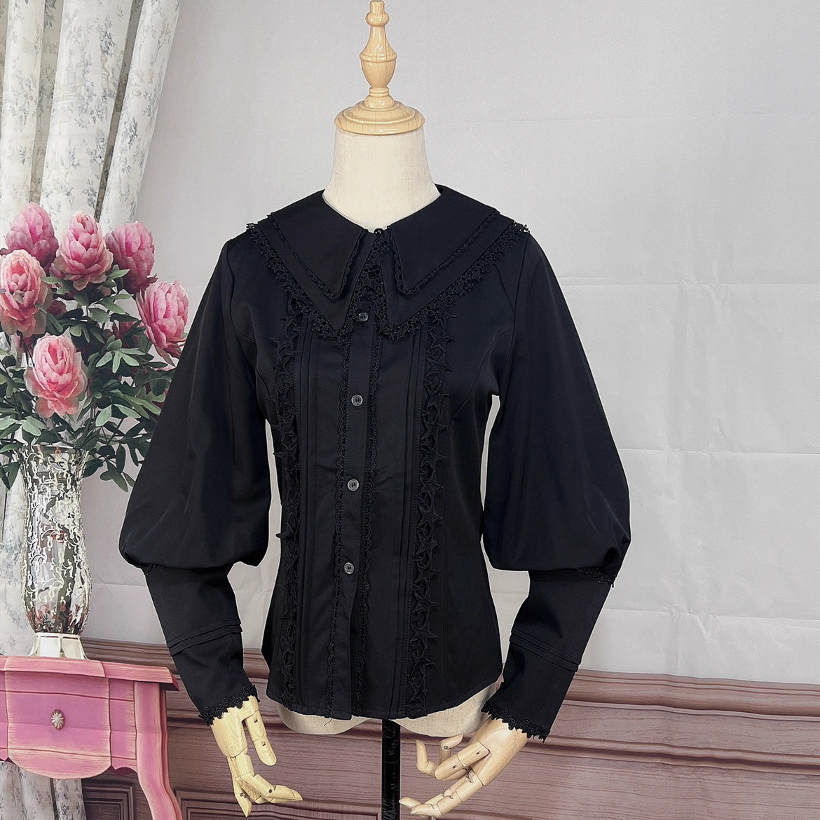 Design Concept:
This Lolita blouse features detachable doll collars and graceful lantern sleeves, blending sweetness with elegance. Available in ivory white and classic black, the design highlights a refined silhouette that pairs beautifully with JSKs or skirts. The removable collar adds versatility, allowing for different styling options, while the soft chiffon texture ensures comfort for both daily wear and tea party gatherings. A perfect balance of practicality and charm for spring and autumn outfits.