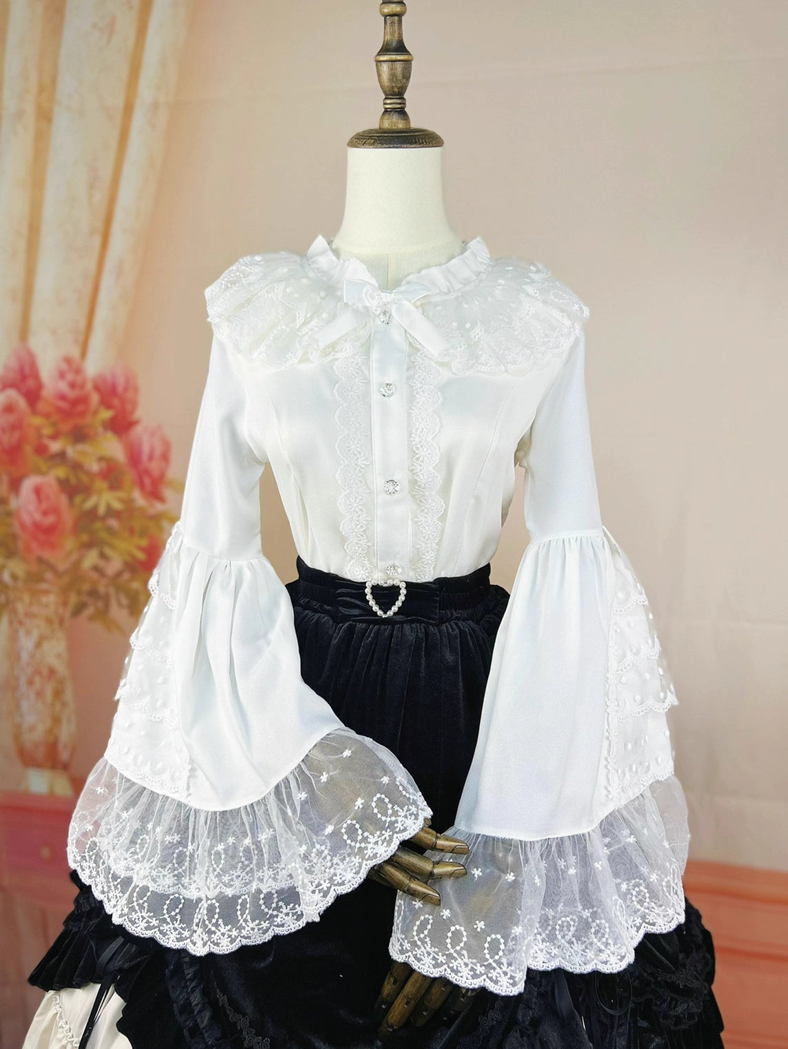 Design Concept:
This Lolita blouse in ivory white captures the elegance of vintage court style. Designed with delicate lace details and graceful flare princess sleeves, it creates a refined silhouette that enhances any Lolita outfit. The slim-fit tailoring complements JSKs and skirts, making it both functional and decorative as an inner layer. Crafted from soft chiffon for comfort, this blouse is perfect for daily wear or tea party occasions, blending luxury with timeless charm.