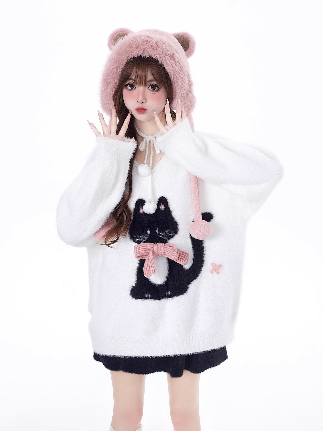 Designed for cozy moments and holiday charm, this ultra-soft ribbed sweater features a delicate kitten-inspired bow detail and a relaxed fit that feels like a warm hug. The classic white and red color blend brings a festive yet gentle vibe, perfect for layering or wearing solo. Whether curled up by the fire or celebrating with friends, this piece wraps you in comfort and quiet elegance—just like a content little cat.