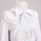 This exquisite blouse merges medieval grandeur with Victorian elegance and steampunk edge. Intricate ruffles cascade from the collar and cuffs, evoking a sense of historical drama perfect for stage performances. The tailored silhouette features period-inspired details like lace accents and billowy sleeves, crafted from high-quality fabric for both visual impact and comfort. Ideal for theatrical wear, cosplay, or alternative fashion, this statement piece captures the romance of bygone eras with a rebellious,