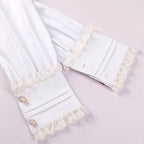 This exquisite blouse merges medieval grandeur with Victorian elegance and steampunk edge. Intricate ruffles cascade from the collar and cuffs, evoking a sense of historical drama perfect for stage performances. The tailored silhouette features period-inspired details like lace accents and billowy sleeves, crafted from high-quality fabric for both visual impact and comfort. Ideal for theatrical wear, cosplay, or alternative fashion, this statement piece captures the romance of bygone eras with a rebellious,