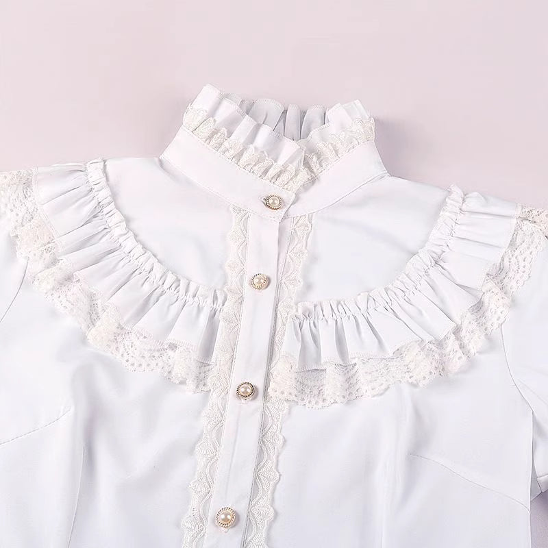 This exquisite blouse merges medieval grandeur with Victorian elegance and steampunk edge. Intricate ruffles cascade from the collar and cuffs, evoking a sense of historical drama perfect for stage performances. The tailored silhouette features period-inspired details like lace accents and billowy sleeves, crafted from high-quality fabric for both visual impact and comfort. Ideal for theatrical wear, cosplay, or alternative fashion, this statement piece captures the romance of bygone eras with a rebellious,