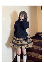 Indulge in sweet comfort with our Milk Puff Lolita blouse! This cozy fleece-lined top features an adorable Peter Pan collar trimmed with delicate lace, perfect for pairing with JSKs during cooler weather. The classic black and white color scheme offers versatile styling options for both classic and sweet Lolita coordinates. Designed for both warmth and style, this charming blouse combines kawaii aesthetics with practical comfort, making it your go-to choice for winter tea parties and festive gatherings.