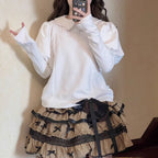 Indulge in sweet comfort with our Milk Puff Lolita blouse! This cozy fleece-lined top features an adorable Peter Pan collar trimmed with delicate lace, perfect for pairing with JSKs during cooler weather. The classic black and white color scheme offers versatile styling options for both classic and sweet Lolita coordinates. Designed for both warmth and style, this charming blouse combines kawaii aesthetics with practical comfort, making it your go-to choice for winter tea parties and festive gatherings.