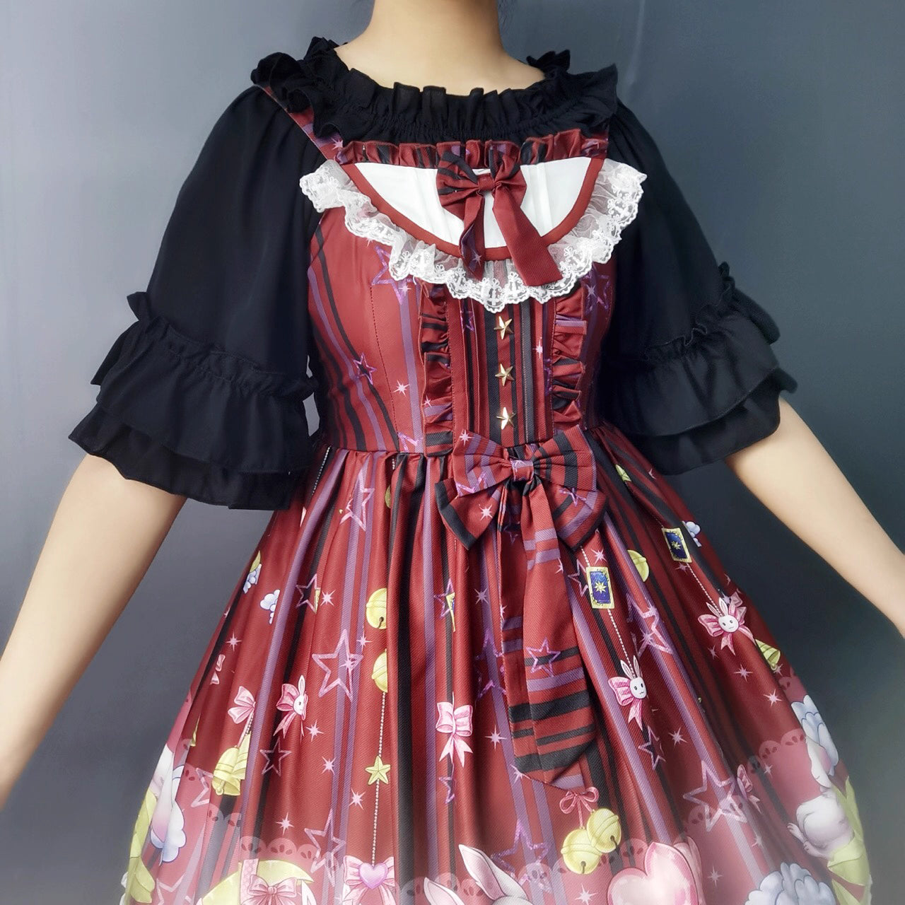 Design Concept:
This Lolita blouse captures a playful yet elegant summer aesthetic with its off-shoulder square neckline and delicate ruffle trims. The short-sleeve, loose-fit design ensures both comfort and style, making it an essential layering piece for Lolita wardrobes. Available in White and Black, it offers versatile choices for sweet or Gothic-inspired looks.