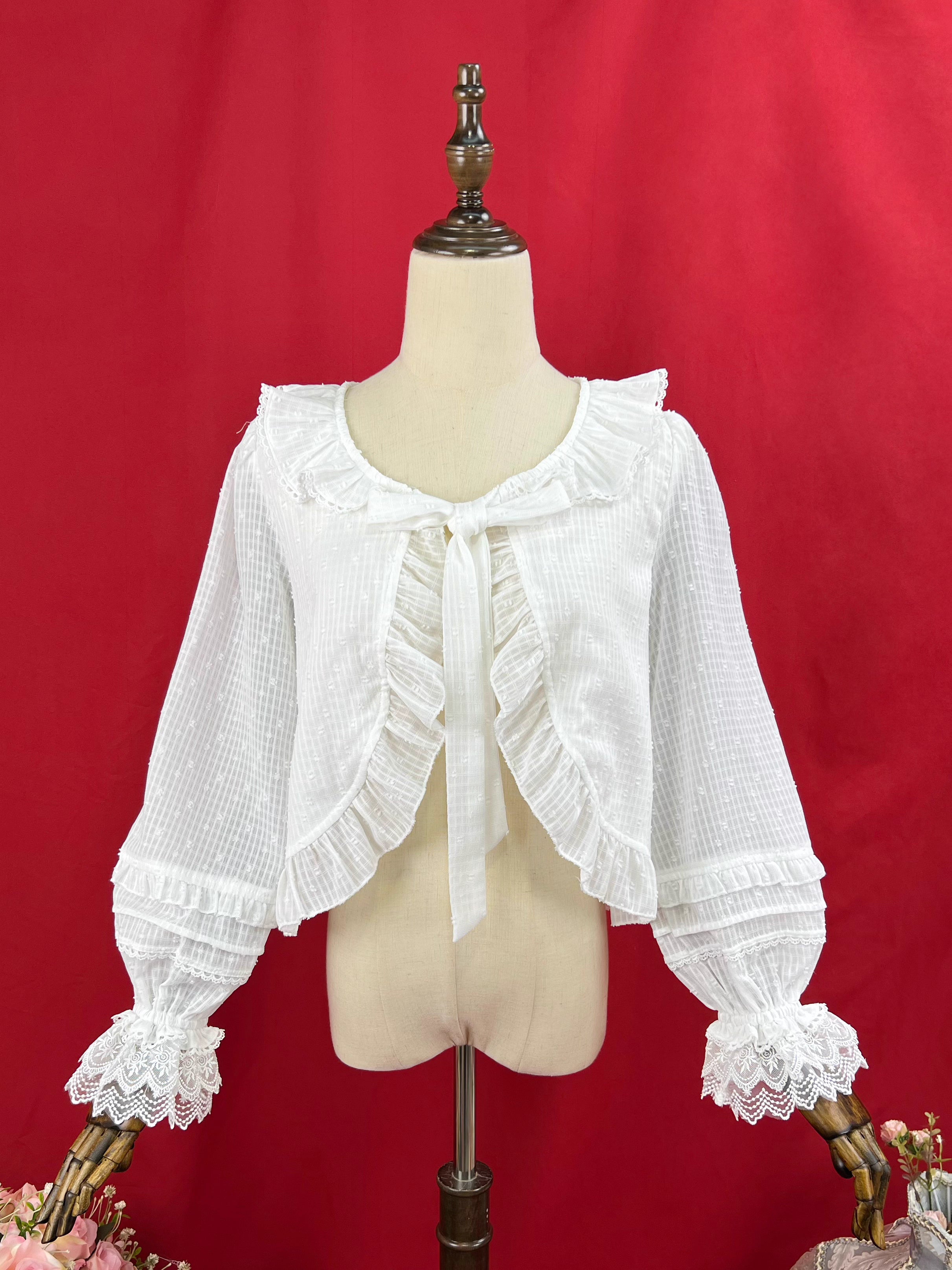 Design Concept:
This short Lolita outerwear cardigan is designed with a sweet and elegant touch, combining practicality with classic Lolita charm. The cropped silhouette highlights the waistline, while the long sleeves provide a delicate sun-protection function, making it a versatile piece for spring and summer. Available in Milky White and Apricot, the design brings a soft, feminine aura to any Lolita outfit.