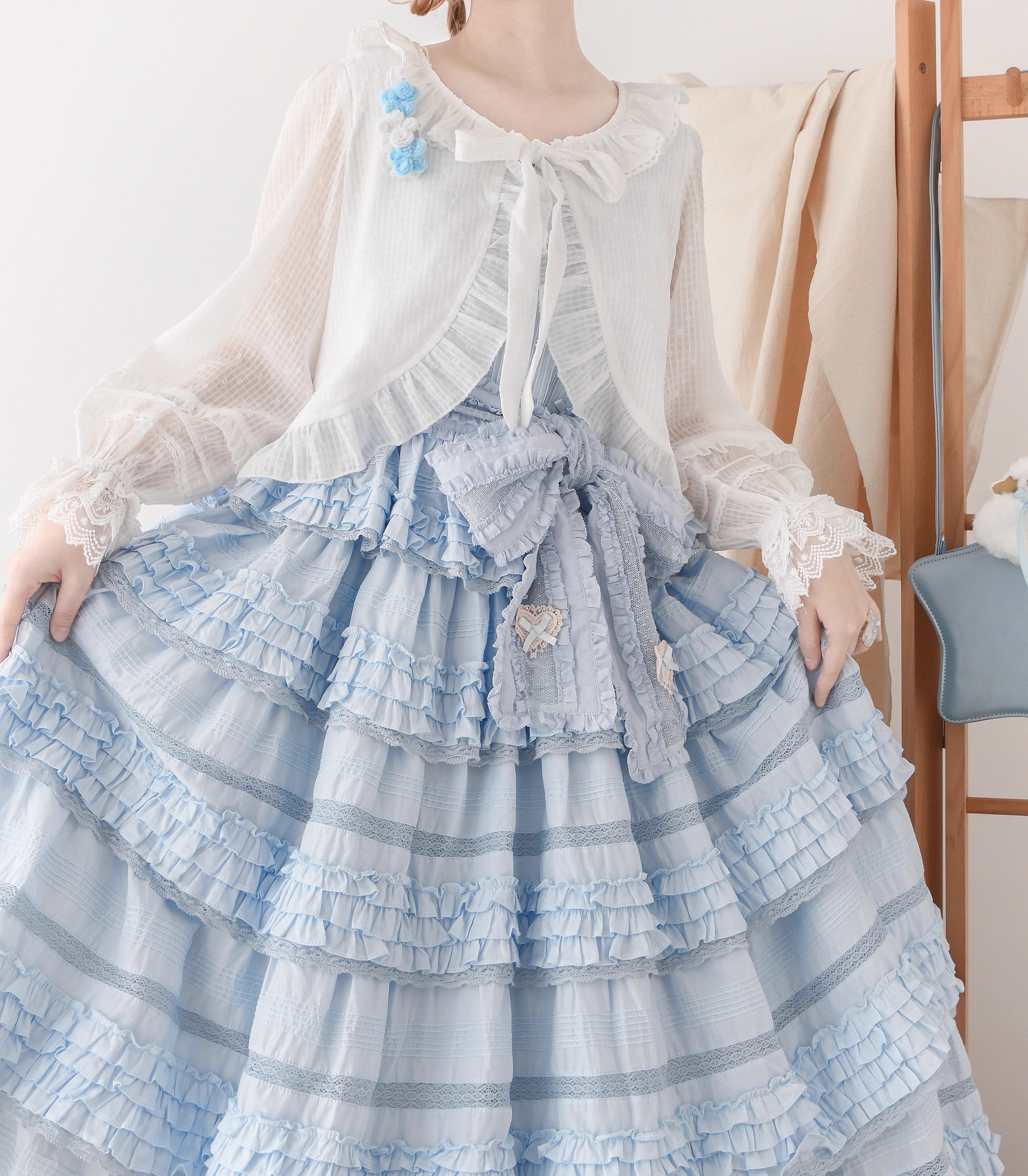 Design Concept:
This short Lolita outerwear cardigan is designed with a sweet and elegant touch, combining practicality with classic Lolita charm. The cropped silhouette highlights the waistline, while the long sleeves provide a delicate sun-protection function, making it a versatile piece for spring and summer. Available in Milky White and Apricot, the design brings a soft, feminine aura to any Lolita outfit.